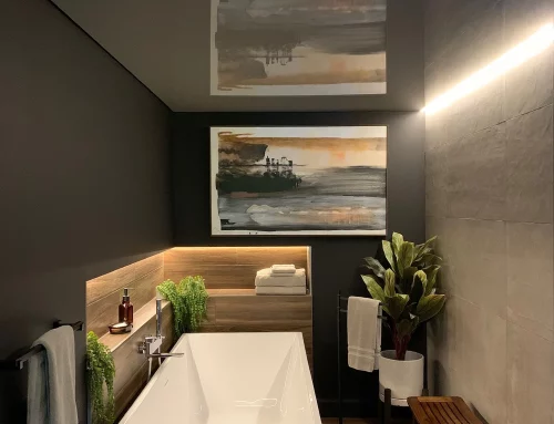 Salle de bains gris laqué avec éclairage périphérique